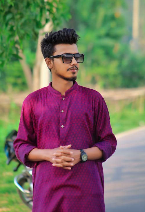 free photo of brunette man in purple traditional shirt